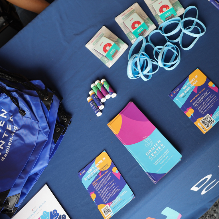 Give away items at an information table at the fair.